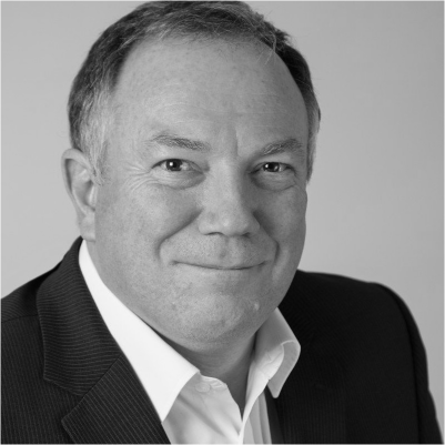 Headshot of Barry Cook, greyscale